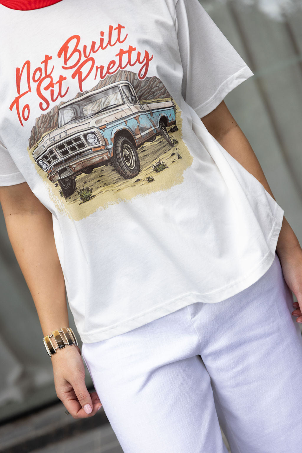 Annie - Not Built To Sit Pretty Tee - White